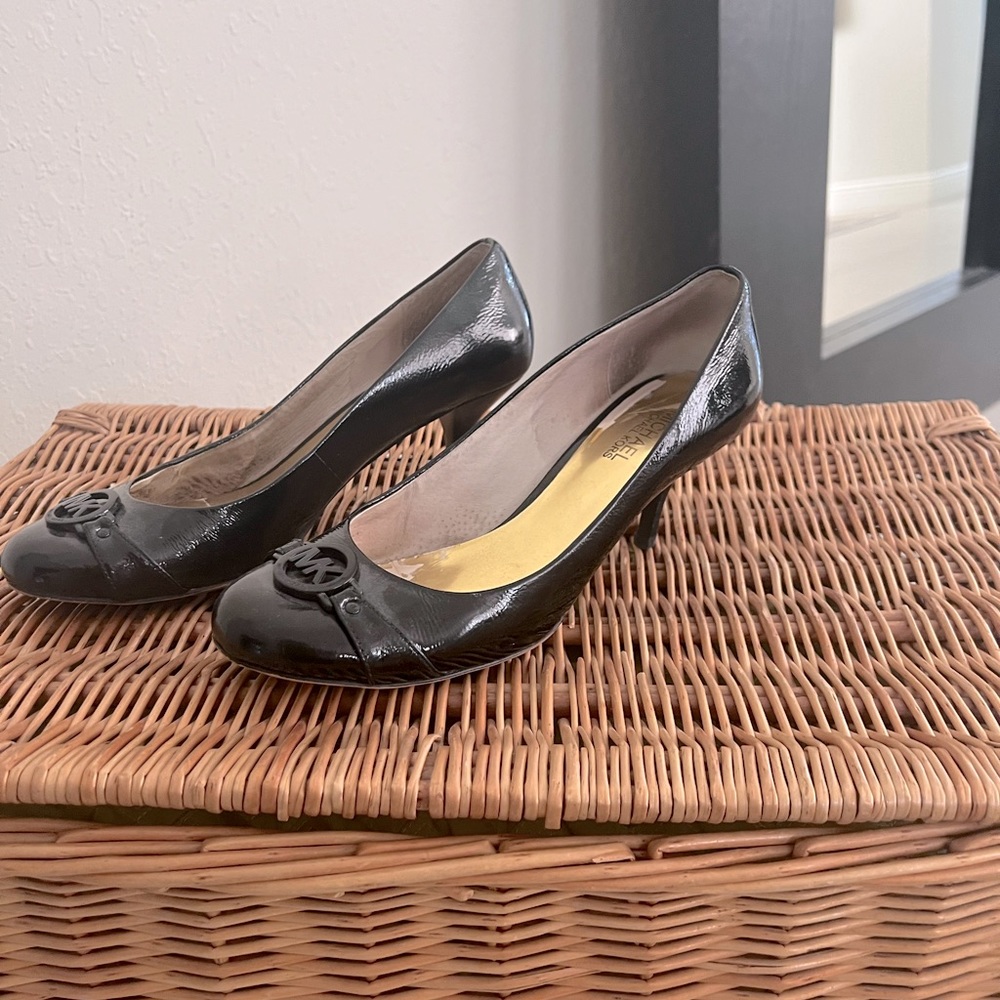 Gently used, black, round toe, Michael Kors pumps!